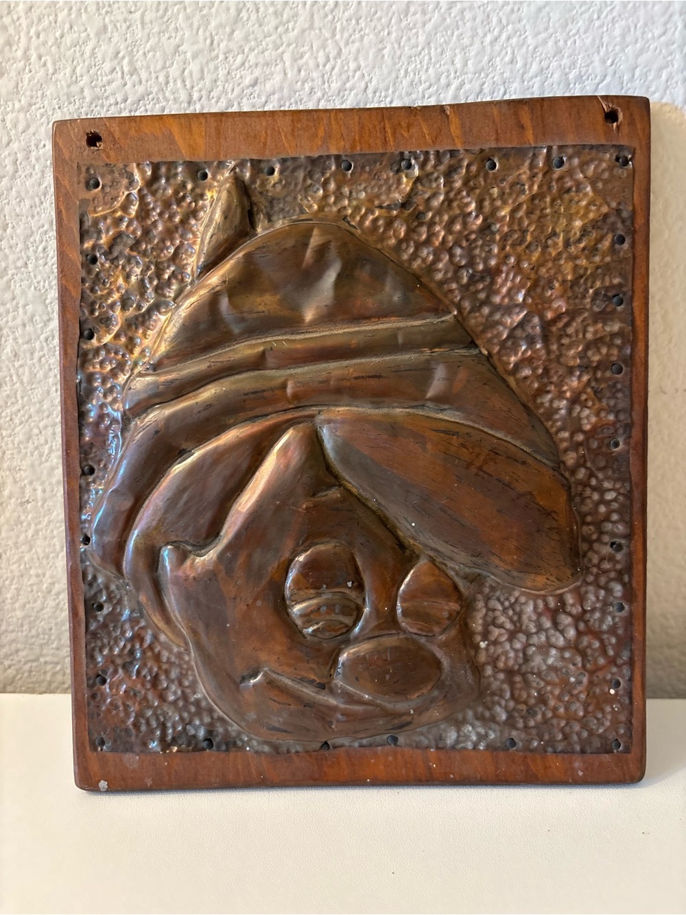 Mid Century Repoussé Metal Relief Wall Art on Wood Pinocchio Silhouette
